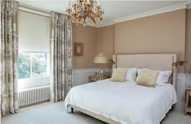  ??  ?? BEDROOM
Soft colours and luxe textures create a quietly serene space. Soren banana fibre and linen lights hang above bespoke Harlosh bedside tables by Pinch