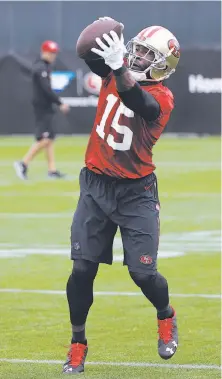  ?? Jeff Chiu / Associated Press ?? Receiver Pierre Garcon said of 49ers quarterbac­k Brian Hoyer: “He’s definitely being a good leader, helping us out.”