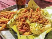  ?? Cajun Kitchen ?? Cajun Kitchen’s crawfish tail po’boy