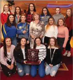  ??  ?? The Wicklow Minors being presented with their All-Ireland ‘Strike for Glory’ medals by Kathleen Woods.