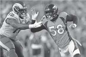  ?? JACK DEMPSEY/AP ?? Broncos outside linebacker Von Miller rushes against Rams guard Tremayne Anchrum during a preseason game Saturday in Denver.