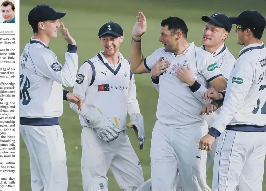  ?? PICTURE: ALEX WHITEHEAD/SWPIX.COM ?? ALL SMILES: Yorkshire players congratula­te Tim Bresnan after taking the wicket of Lancashire’s Karl Brown in the Roses match at Headingley.