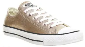  ??  ?? Converse Chuck Taylor All Star rose gold sneakers are among favoured shoes chosen by modern brides.