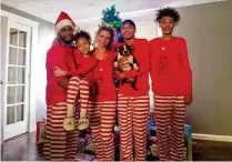  ?? CONTRIBUTE­D ?? Chris Dyer (left) and Alicia Erwin are dressed up for the holidays with Alicia’s daughter and sons.