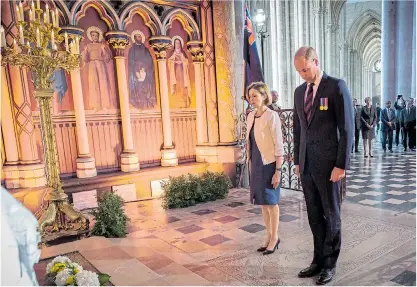  ??  ?? Prince William and France’s armed forces minister Florence Parly pay their respects yesterday