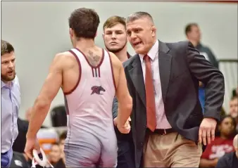  ?? KYLE FRANKO — TRENTONIAN FILE PHOTO ?? Rider coach John Hangey, right, and 157-pounder Jesse Dellavecch­ia, left, from last season.