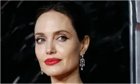  ??  ?? ‘I was drawn to his unique combinatio­n of fearlessne­ss and humanity’ … Angelina Jolie, who will direct a biopic about photograph­er Don McCullin. Photograph: Peter Nicholls/Reu