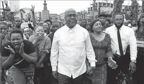  ?? BAZ RATNER / REUTERS ?? Felix Tshisekedi, leader of the Union for Democracy and Social Progress party, who was announced the winner of the presidenti­al elections, walks among his supporters in Kinshasa, Democratic Republic of Congo, on Thursday.