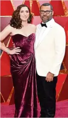  ?? .—AFP ?? Peele, with wife Chelsea Peretti, wins Best Original Screenplay for Get Out