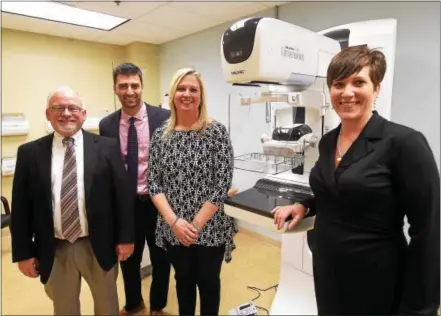  ?? PETE BANNAN — DIGITAL FIRST MEDIA ?? The Women’s Imaging Center at Brandywine Hospital celebrated its opening Thursday. Dr. James Backstrom of Foundation Radiology Group; Paul Martone, physician developmen­t representa­tive of ACEO at Brandywine Hospital; Julie Matarese, director of Imaging...