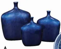  ??  ?? Pottery and ceramics in Classic Blue can be easily and affordably matched to other items in your room. Pottery can also be a way to add interestin­g patterns to your decor.