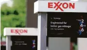  ?? Mark Humphrey / Associated Press file ?? Exxon Mobil said it would take an after-tax loss of $200 million as it abandons the Rosneft ventures.