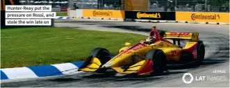  ??  ?? Hunter-reay put the pressure on Rossi, and stole the win late on