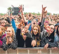  ?? Picture: Steve MacDougall. ?? Crowds enjoy a performanc­e by Jess Glynne at T in the Park this year.