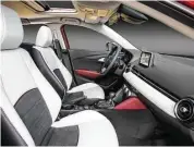  ??  ?? Drivers and passengers are embraced with amenities like available leather and Lux Suede two-tone seats, Mazda Radar Cruise Control and Active Driving Display head-up unit.