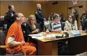  ?? ED WHITE — THE ASSOCIATED PRESS ?? From left, James Crumbley, defense lawyer Mariell Lehman, Jennifer Crumbley, and defense lawyer Shannon Smith await sentencing in Oakland County, Mich., court on Tuesday. The Crumbleys were convicted of involuntar­y manslaught­er for a school shooting committed by their son in 2021.