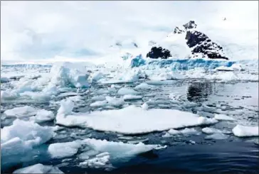  ?? ANNIE GROER FOR THE WASHINGTON POST ?? Ten days away from the summer solstice, sea ice has broken up quite a bit, but skippers of smaller vessels still must use extreme caution.