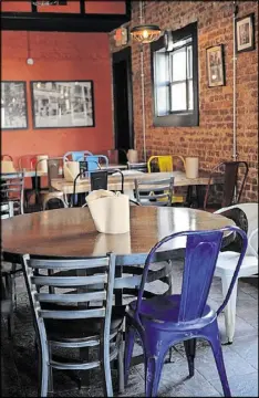  ??  ?? In July, Anthony Spina opened a long-planned new incarnatio­n of O4W Pizza as a full-service restaurant in the former Steverino’s space on Main Street in Duluth.
