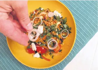  ?? CONTRIBUTE­D ?? Chef Ilona Daniel's Greek lentil salad is affordable and, because it can easily be made ahead of time leaves with plenty of time to spend with guests when grilling outside this summer.