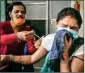  ?? PTI ?? A healthcare worker administer­s a Covid vaccine dose, in Gurugram, on Tuesday