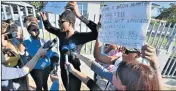  ?? Picture: IVOR MARKMAN ?? SUPPORTING VICTIMS: Supporters protest outside the Hawks’ Port Elizabeth headquarte­rs