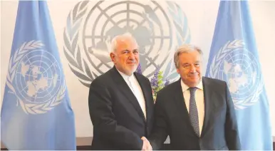  ?? (Lucas Jackson/Reuters) ?? IRANIAN FOREIGN MINISTER Javad Zarif greets UN Secretary-General Antonio Guterres at UN Headquarte­rs in July. Sen. Rand Paul tried to set up a meeting between Zarif and President Donald Trump while the former was in New York.