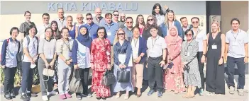  ?? ?? Maria (front, sixth left) with the participan­ts of 2024 Biorisk Advisor Twinning Programme during their visit to the Kota Kinabalu Public Health Laboratory.