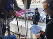  ?? JENNA FRYER / AP ?? Jimmie Johnson (left) and his former crew chief Chad Knaus (right), who split after 17 seasons together in 2018, have been reunited by work four times this season. Both say their relationsh­ip is currently in a good place.