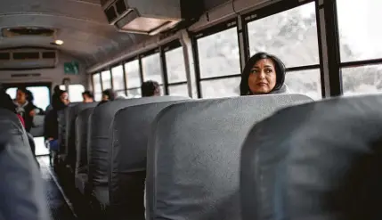  ??  ?? Middle College High School principal Diana Del Pilar accompanie­s her students on a field trip to a Houston Community College campus to prepare for the next step after graduation. Del Pilar aims to get all her graduates college-ready.