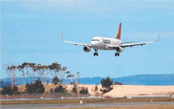  ?? Picture: SAM ROSEWARNE ?? First Tigerair plane direct from Gold Coast to Hobart comes in to land at Hobart Airport.