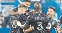  ?? GRAHAM HUGHES THE CANADIAN PRESS ?? CF Montreal players celebrate a goal by Samuel Piette, not shown, against Toronto FC on Friday night.