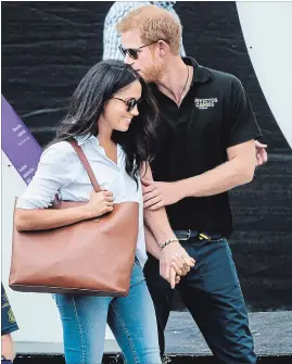  ?? NATHAN DENETTE THE CANADIAN PRESS ?? Sept. 25: Prince Harry and Meghan Markle arrive at a wheelchair tennis match during the Invictus Games in Toronto. It’s his first public appearance with Markle. Her ripped jeans from the California brand Mother sell out online in three days. At...