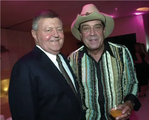  ??  ?? MEDIA GIANT: Former Channel 9 boss and ‘ultimate star-wrangler’ Sam Chisholm enjoys a chat with Molly Meldrum.