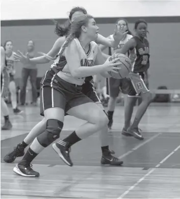  ?? [WHITNEY NEILSON / THE OBSERVER] ?? Cobi Morris goes for the lay up in the EDSS senior girls’ basketball’s tight 60-49 loss to SJAM on Sept. 29. Morris got 18 points, while Natalie Mayer and Jackie Wideman both got 14.