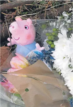  ?? Picture: Dougie Nicolson. ?? People have been leaving flowers and cuddly toys, including this Peppa Pig, at the main gate leading to the family home.