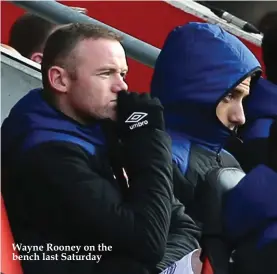  ??  ?? Wayne Rooney on the bench last Saturday