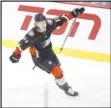  ?? Canadian Press via AP ?? The Ducks’ Trevor Zegras (11) scores the tying goal against the Winnipeg Jets during the third-period on Thursday in Winnipeg, Manitoba. The Jets won 3-2.