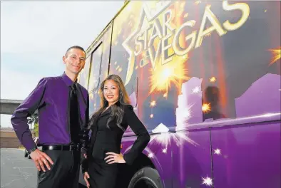  ?? PHOTOS by RONDA CHURCHILL/ LAS VEGAS REVIEW-JOURNAL ?? Star of Vegas CEO Star Frank, left, and marketing director Jennifer Batoon stand outside the Star of Vegas mobile lounge. The 40foot long luxury recreation­al vehicle is a mobile office, rolling billboard and possible passenger hauler.