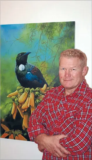  ?? Photo: ELENA MCPHEE/ FAIRFAX NZ ?? Phill Dunn in front of ‘‘Sweet time of year’’, a painting he is finishing at the moment.