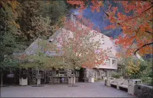  ?? JACKIE BURRELL — STAFF ?? Multnomah Falls Lodge, which was built in 1925, houses a restaurant, a gift shop and a coffee cart.