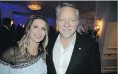  ??  ?? Award-winning Canadian photograph­er Edward Burtynsky kibitzes with Lauren Hornor, the co-chair of the second annual Waterkeepe­r Gala, a key source of funding to protect B.C.’s precious rivers, lakes, streams and beaches.