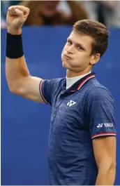  ?? — AP ?? Hubert Hurkacz of Poland celebrates winning the Winston-Salem Open final against Benoit Paire of France in Winston-Salem, North Carolina (USA).