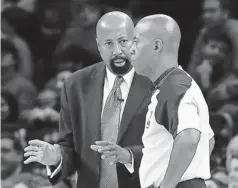  ?? ANTHONY GRUPPUSO, US PRESSWIRE ?? Knicks coach MikeWoodso­n, discussing a call with referee Marc Davis, says he’s not surprised by the play of Carmelo Anthony.