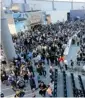  ?? T. Hagan/the Canadian Press ?? Fans walk in the concourse at Investors Group Field in Winnipeg, shiny new home of the Blue Bombers.