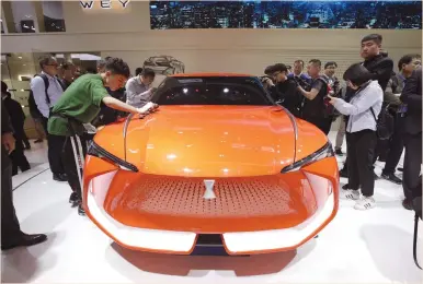  ?? (Jason Lee/Reuters) ?? A WEY X concept car is displayed during a media preview of the Auto China 2018 auto show in Beijing yesterday. Earnings season has gotten off to a stronger start than was initially expected, with the growth rate for the quarter currently at 22%,...