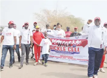  ??  ?? Founder, Valuechan Sickle Cell Foundation, Alhaji Musa Bashir Usman, Chairman Society for Petroleum Engineers Internatio­nal Abuja, Chapter's 10th Anniversar­y organising committee, Dr Ikechukwu Okafor, leading other dignitarie­s on a 'Walk for Sickle Cell' in Abuja yesterday