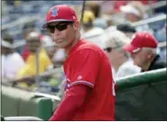  ?? THE ASSOCIATED PRESS ?? FILE - In this file photo, Philadelph­ia Phillies manager Gabe Kapler watches from the dugout before a baseball spring exhibition game against the New York Yankees, in Clearwater, Fla.