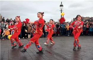  ?? ?? Members of the Scottish Chinese community take part in Edinburgh Chinese New Year festivitie­s to celebrate the Year of the Rabbit at the Mound on January 22, 2023, in Edinburgh, United Kingdom.