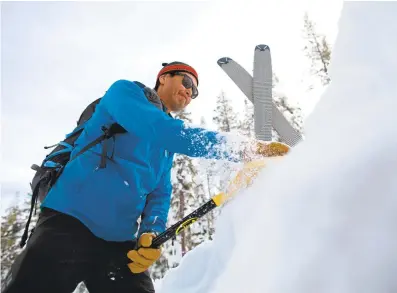  ?? ETHAN BARON/STAFF ?? Bay Area technology lawyer and backcountr­y skier Bill Wang tests the snowpack near Lake Tahoe for weak layers that could cause an avalanche, part of a hands-on safety protocol now getting a boost from rapid technologi­cal advances.