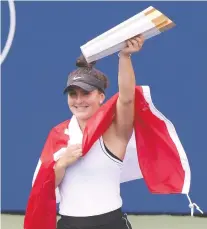  ?? DAN HAMILTON/USA TODAY SPORTS ?? After a week of ups and downs in which she played through several three-set marathons, Bianca Andreescu became a champion on home soil Sunday at Toronto’s Aviva Centre.